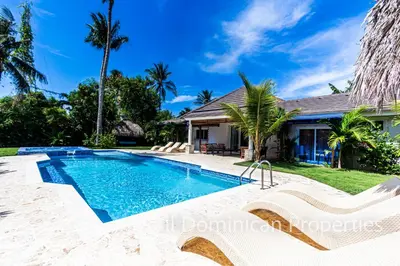 an image of a swimming pool in front of a house at Sosua Private villa, 9 br, guest friendly, Up to 20 persons! in Sosúa
