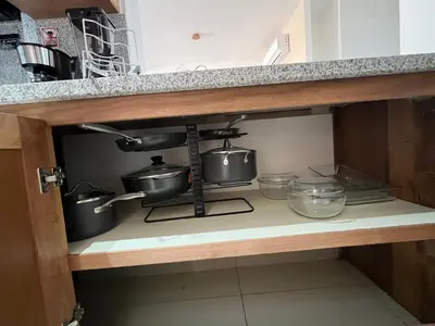 a kitchen with pots and pans on a stove at GH Condos by Sunrise2 in San Felipe de Puerto Plata