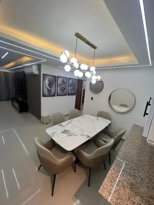 a dining room with a table and chairs at Apartamento de Lujo in La Estrella