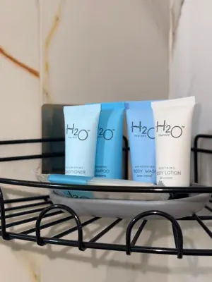 a shelf with three products on top of it at Mi casa Amalia in Santa Cruz de Barahona