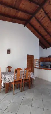 a dining room with a table and four chairs at MOREHomes - Caribe Slow Cost in Las Galeras