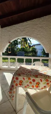 a white table with a blanket on top of it at MOREHomes - Caribe Slow Cost in Las Galeras