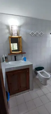 a bathroom with a sink and a toilet at MOREHomes - Caribe Slow Cost in Las Galeras