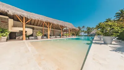 a swimming pool at the resort at Charming two-bedroom apartment in Las Terrenas in Las Terrenas