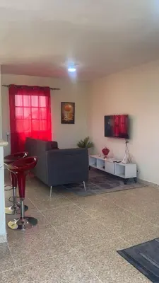 a living room with a couch and a table at SDQ Apartment Marbella 4 in La Ureña