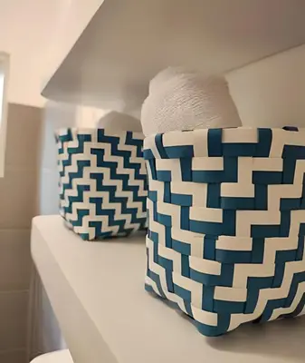 two pillows sitting on a shelf in a room at Bayahibe Rose C - Gray Elegance in San Rafael del Yuma