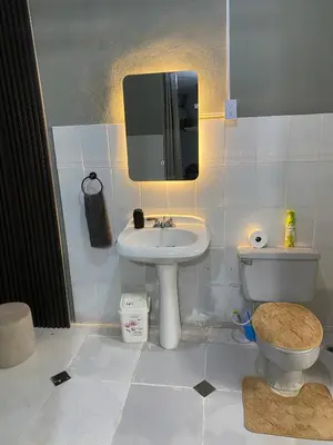 a bathroom with a sink and a toilet at Habitación a 15min del aeropuerto in La Caleta