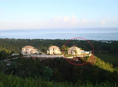an aerial view of a house on a hill at Villa with Stunning Ocean View, Infinity pool in Las Terrenas