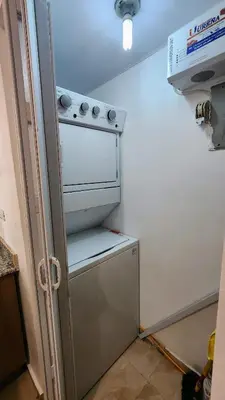 a refrigerator with an oven inside of it at vista hermosa in Cabrera