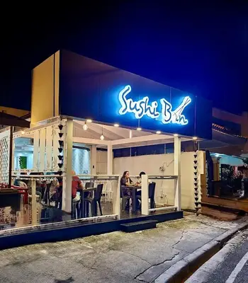 a sushi bar with a sign on the front of it at Heyday Studio With Full Kitchenette in Santiago de los Caballeros