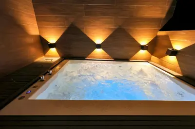 a jacuzzi tub in a spa with lights at 504 New, Fantastic Rooftop with Private Jacuzzi in La Laguna