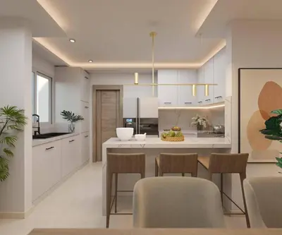 a kitchen with white cabinets and a table and chairs at Los Castillos Resort in Los Altos de Jalisco