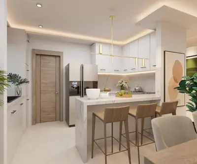 a kitchen with white cabinets and a table and chairs at Los Castillos Resort in Los Altos de Jalisco