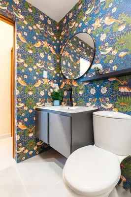 a bathroom with a toilet and a mirror at Beach Escape -Pool Patio -Free Parking -Pets in Villas del Mar