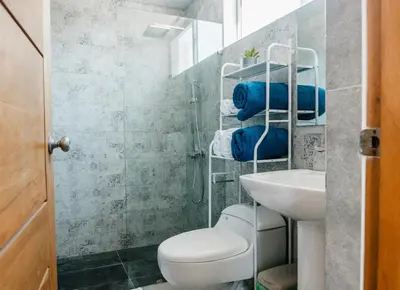 a bathroom with a toilet and a sink at Caribey2 APT 2D2 in Colorado