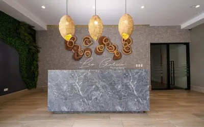 a lobby with a sign for a luxury hotel at Rosa s Hidden Gem beach wifi in Los Corrales
