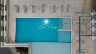 a large glass window in a building with a sign on it at Rosa s Hidden Gem beach wifi in Los Corrales