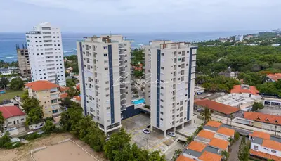 an aerial view of two tall buildings in a city at Rosa s Hidden Gem beach wifi in Los Corrales
