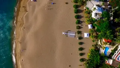 an overhead view of a beach with houses and the ocean at Central, a 5 Minutos de Playa, AC, Piscina, Cómodo, Bares, Rest in Sosúa