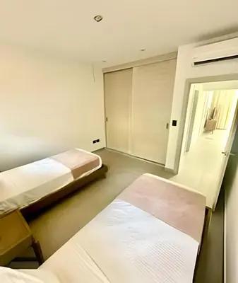 a hospital room with two beds and a window at Aqua Esmeralda by Advantage Club in La Laguna