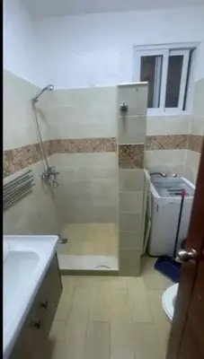 a bathroom with a shower and a sink and a toilet at Apartamento amueblado a 5 minutos de la playa in Bayahibe