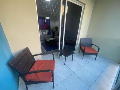 a room with three chairs and a table at Apartamento en Caleta, La Romana in La Romana