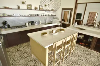 a kitchen with a island with a counter top at Villa Lukner Las Terrenas in Las Terrenas