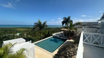 a view of a swimming pool from a house at Villa Blanca, Las Terrenas, 4 chambres in Las Terrenas