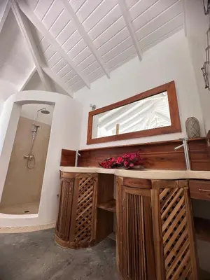 a bathroom with a sink and a shower at Villa Blanca, Las Terrenas, 4 chambres in Las Terrenas