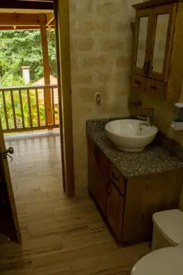 a bathroom with a sink and a toilet at Spectacular Country Villa in Pedro Brand