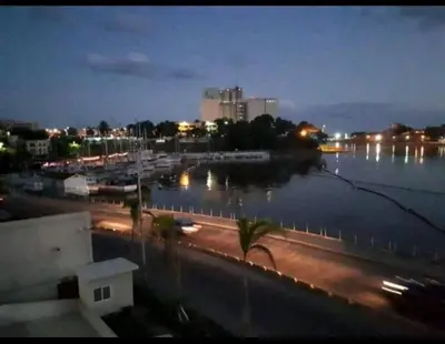 a view of a body of water at night at Luxury apartment Riviera Colonial in Calero