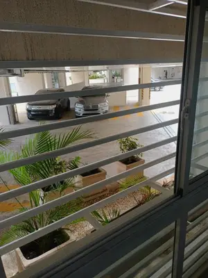 a view from the window of a house with plants at Luxury apartment Riviera Colonial in Calero