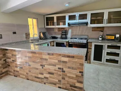 a kitchen with a counter top in a room at Casa Madome in Pedernales