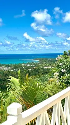 a view of the ocean from a balcony at Villa blanca chambre d'hôtes vue sur mer in Las Terrenas