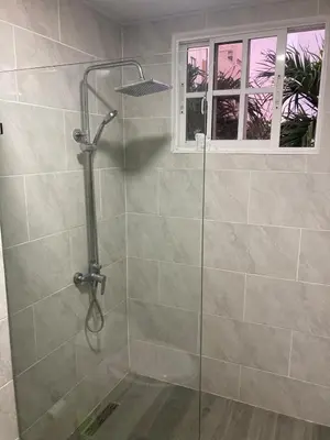 a shower with a glass door in a bathroom at Luxury Beach flat in Bávaro Puntacana! in Punta Cana