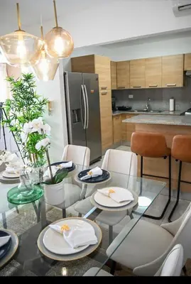a kitchen and dining room with a table and chairs at Modern Colonial Water View in Calero