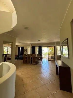 a large room with a kitchen and a dining room at CASA Angelo in Sosúa