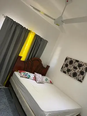 a bedroom with a bed and a ceiling fan at Villakeyden1 in Colorado