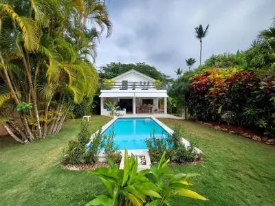 a house with a swimming pool in a yard at Canela House 3BR Near to the beach in Las Terrenas