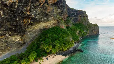 an aerial view of a tropical island with a beach at Playa Grande House in Las Galeras