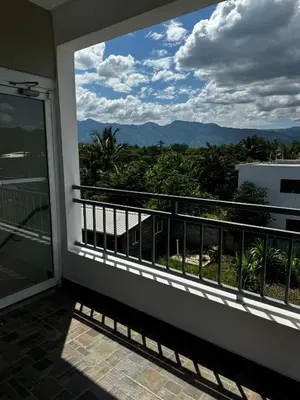 a balcony with a view of the mountains at Hermoso Apartamento en 3er nivel con terraza privada in Bonao