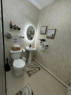 a bathroom with a toilet and a sink at Sweet dreams Tropical paradise in San Isidro