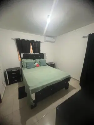 a bedroom with a large bed in a room at Beautiful accommodation in Los Paredones