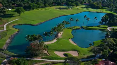 an overhead view of a golf course with a pool of water at Villa en Casa de Campo 10127 in Colorado