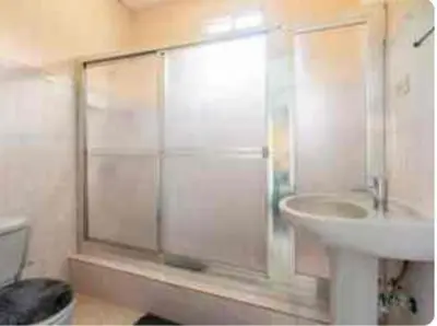 a bathroom with a sink and a shower at paradise ranch san cristobal in San Cristóbal