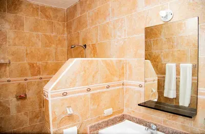 a bathroom with a sink and a mirror at Boom Ranch in Las Galeras