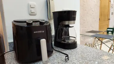 a coffee maker sitting on top of a counter at Modern and Luxury apartment in La Grúa