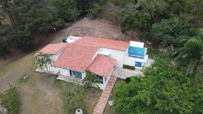 an overhead view of a white house with red roofs at La Mansion en SAJOMA Villa 15 3br with private Pool in San José de Las Matas