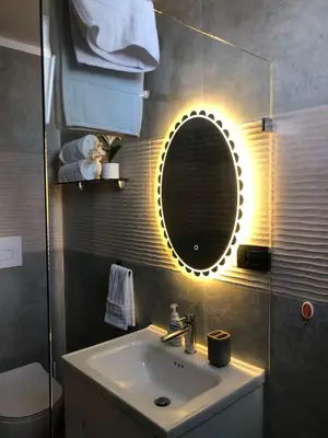 a bathroom with a sink and a mirror at Cozy 2 bedroom Beach Apto in Bayahibe