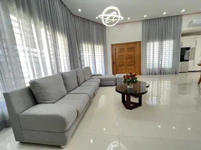 a living room with a couch and a table at magnifica villa en cabrera in Cabrera